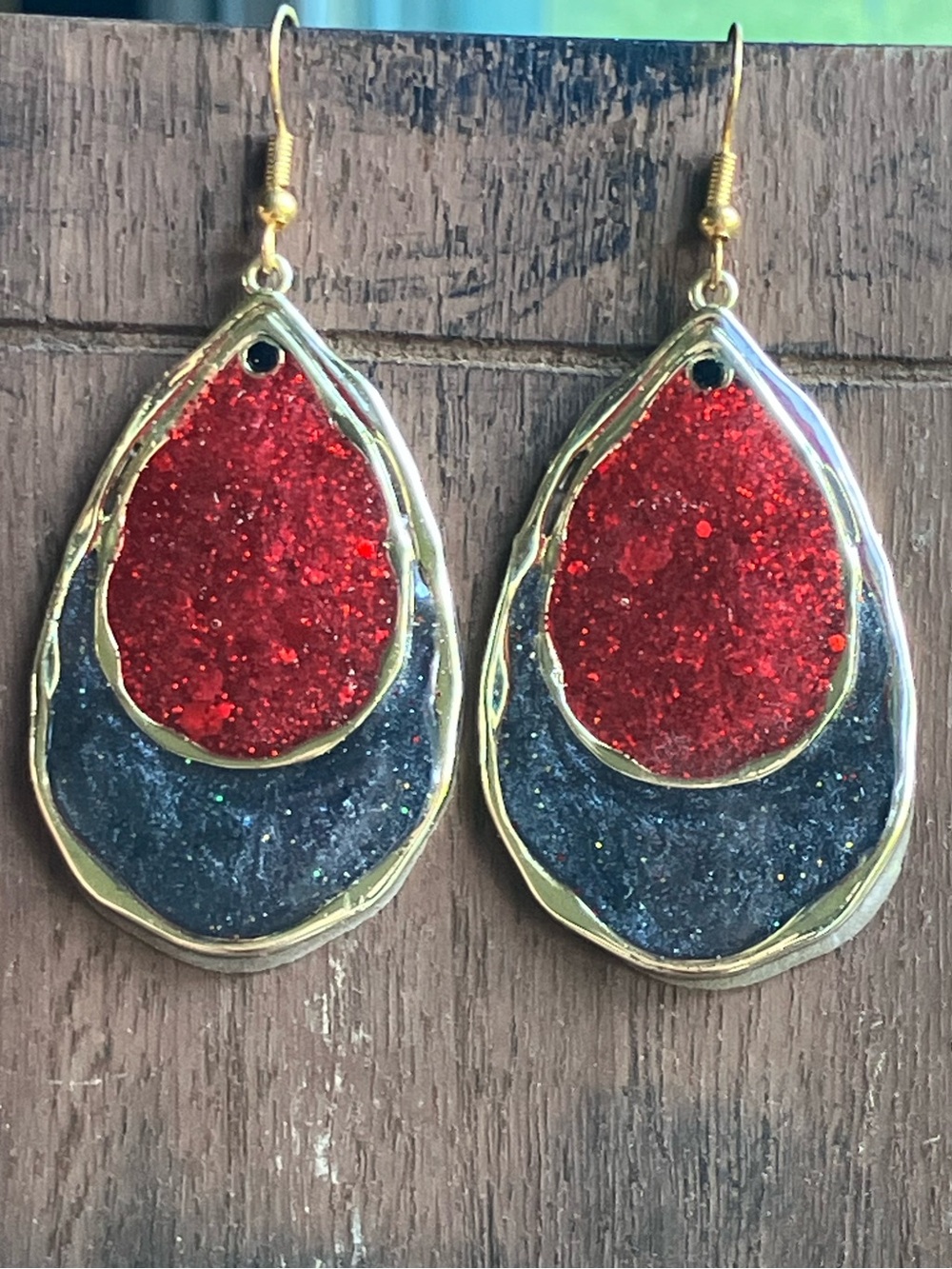 Red and Black dangle earrings with gold accents
